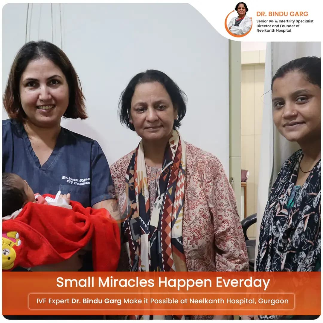 Dr. Bindu Garg (Centre) and her teammate Dr. Swati Kanawa with a baby in her Lap (Left side), Baby's mother (right corner)